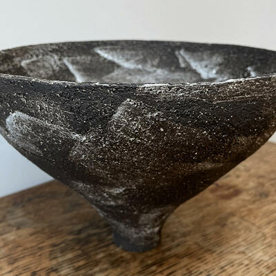 Black coiled stoneware vessel