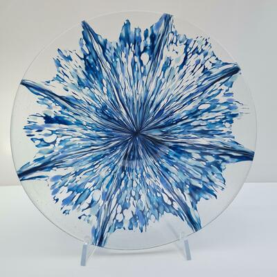 Large fused glass bowl in blue and clear glass in an explosion design