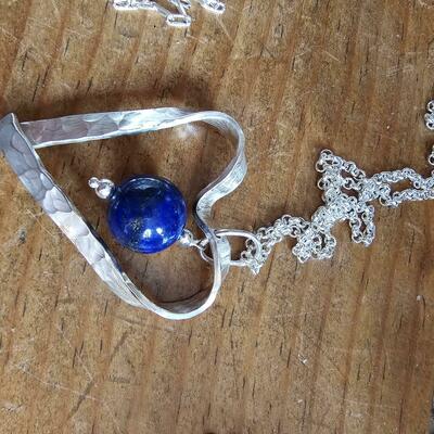 Hammered sterling heart, with Lapis Lazuli bead.
