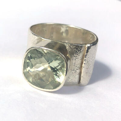 Silver ring with a green quartz