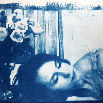 "Self portrait with flowers", analogue photography and cyanotype on watercolour paper, 2020