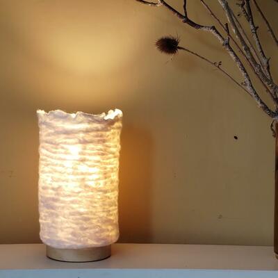 Wetfelted lamp with crumple effect