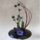 Ikebana flower arrangement with purple anemone and curved branches