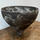 Black coiled stoneware vessel
