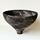 Black stoneware.  Coiled open vessel.