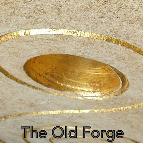 A swirl and void cut into Ancaster limestone, gilded with 24ct gold.