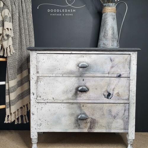 Chest of Drawers with a Snow Horse on a Chippy Textured Background