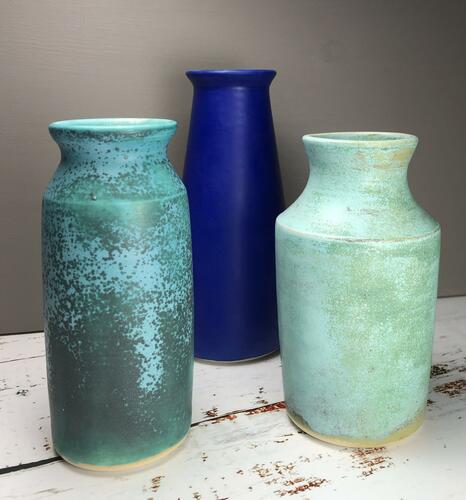 Three stoneware vases in satin glazes