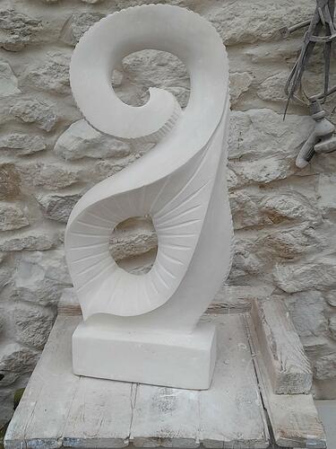 Doodle and is carved from Limestone