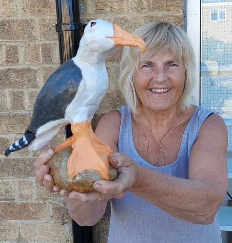Alison with Large Gull that stands on 6 large stacking stones as a garden feature  £175 with Pottery stacking stones and central rod.