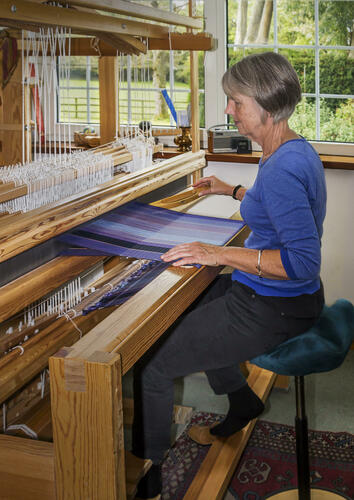 Mary Lowry at the loom