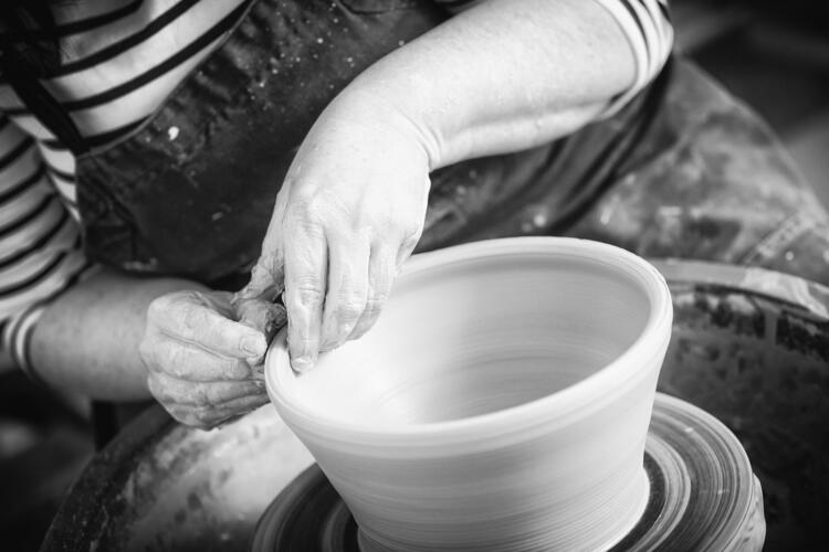 Throwing a bowl on potter's wheel