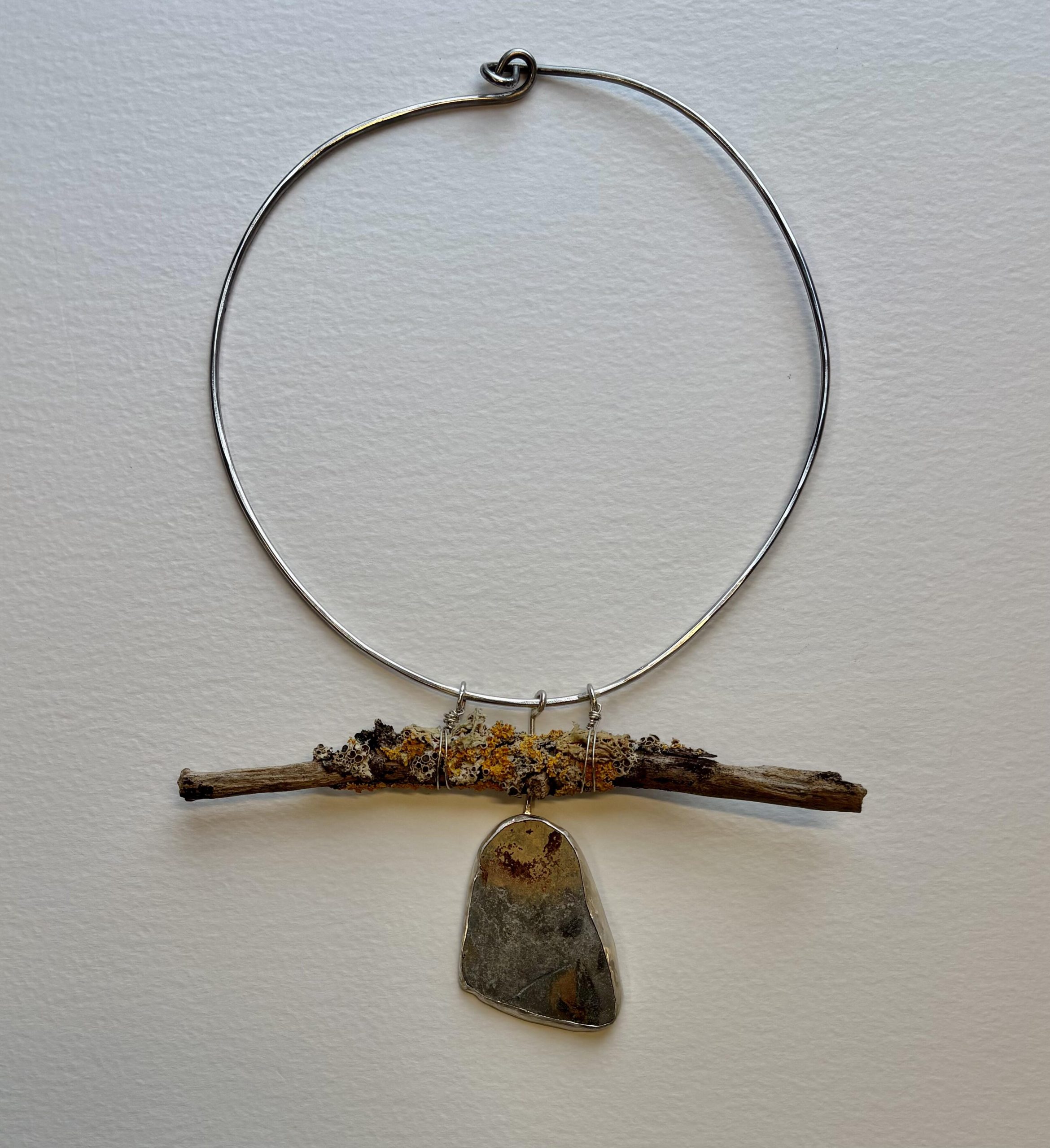 Jane Griffiths: Pendant of found wood and stone on a sterling silver choker