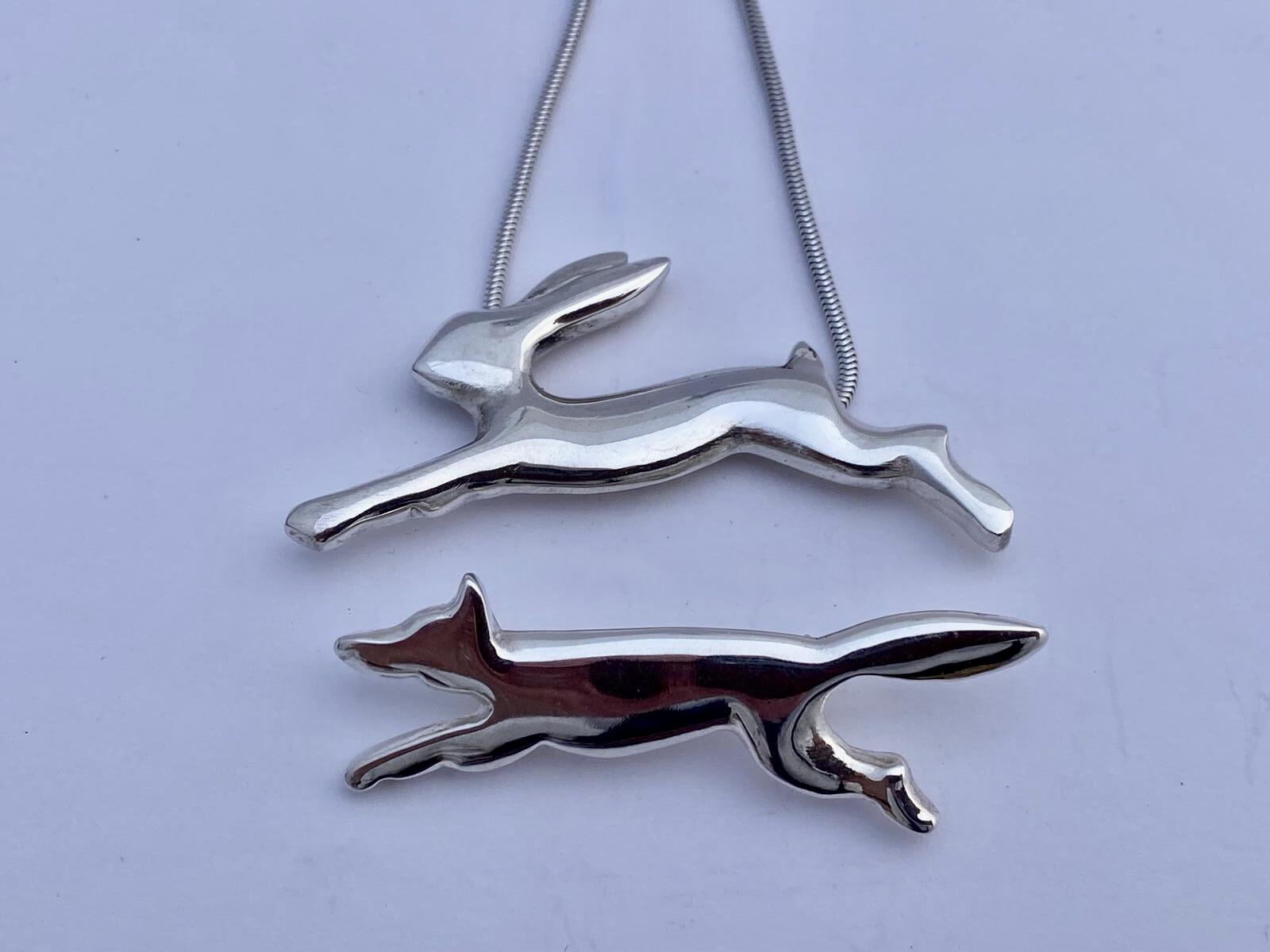 Tess Blenkinsop: Silver hare necklace and silver fox brooch