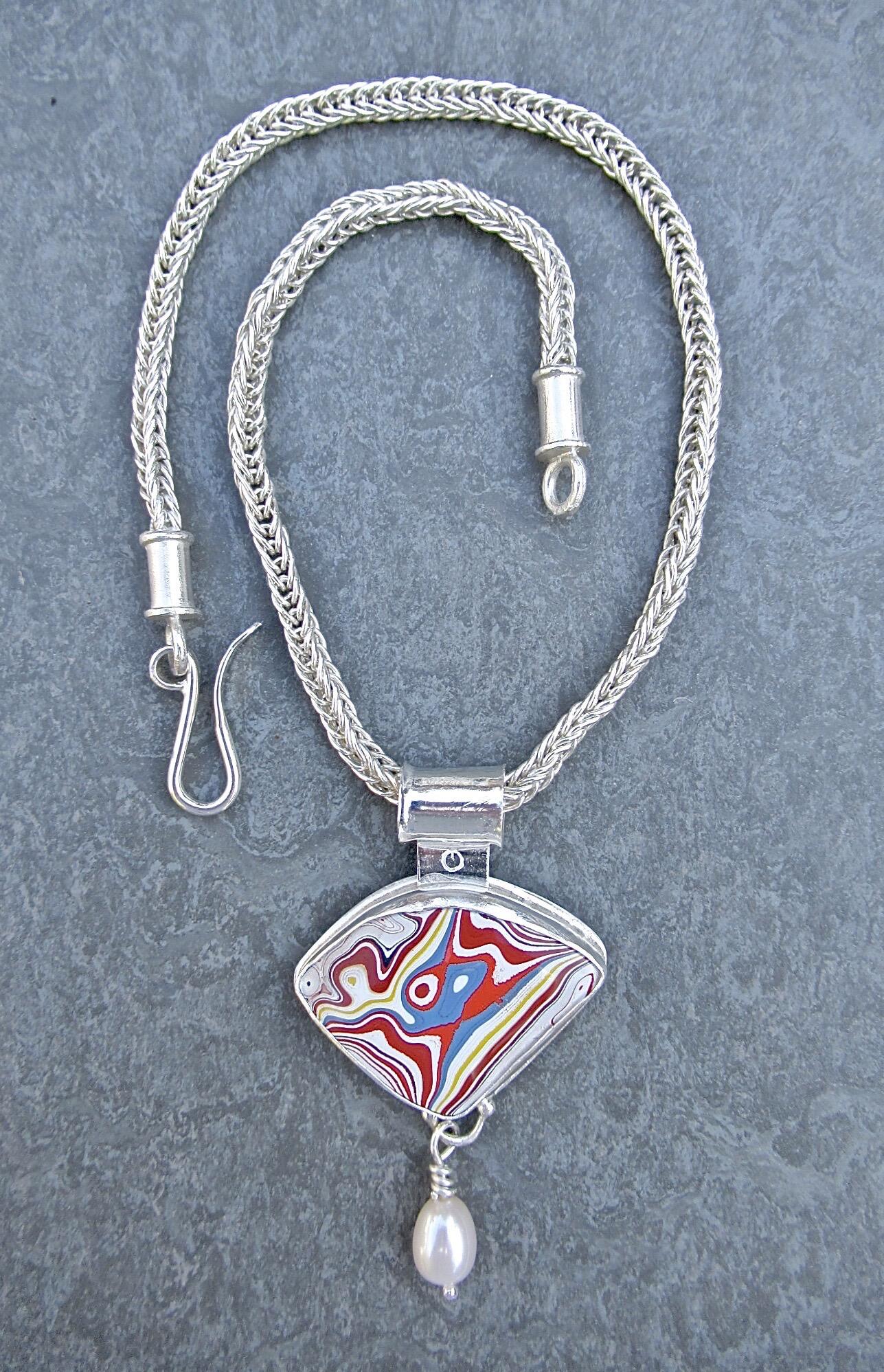 Tony Thomson: Tony Thomson Necklace: removable pendant: Fordite set in silver with pearl on handmade 'roman' chain