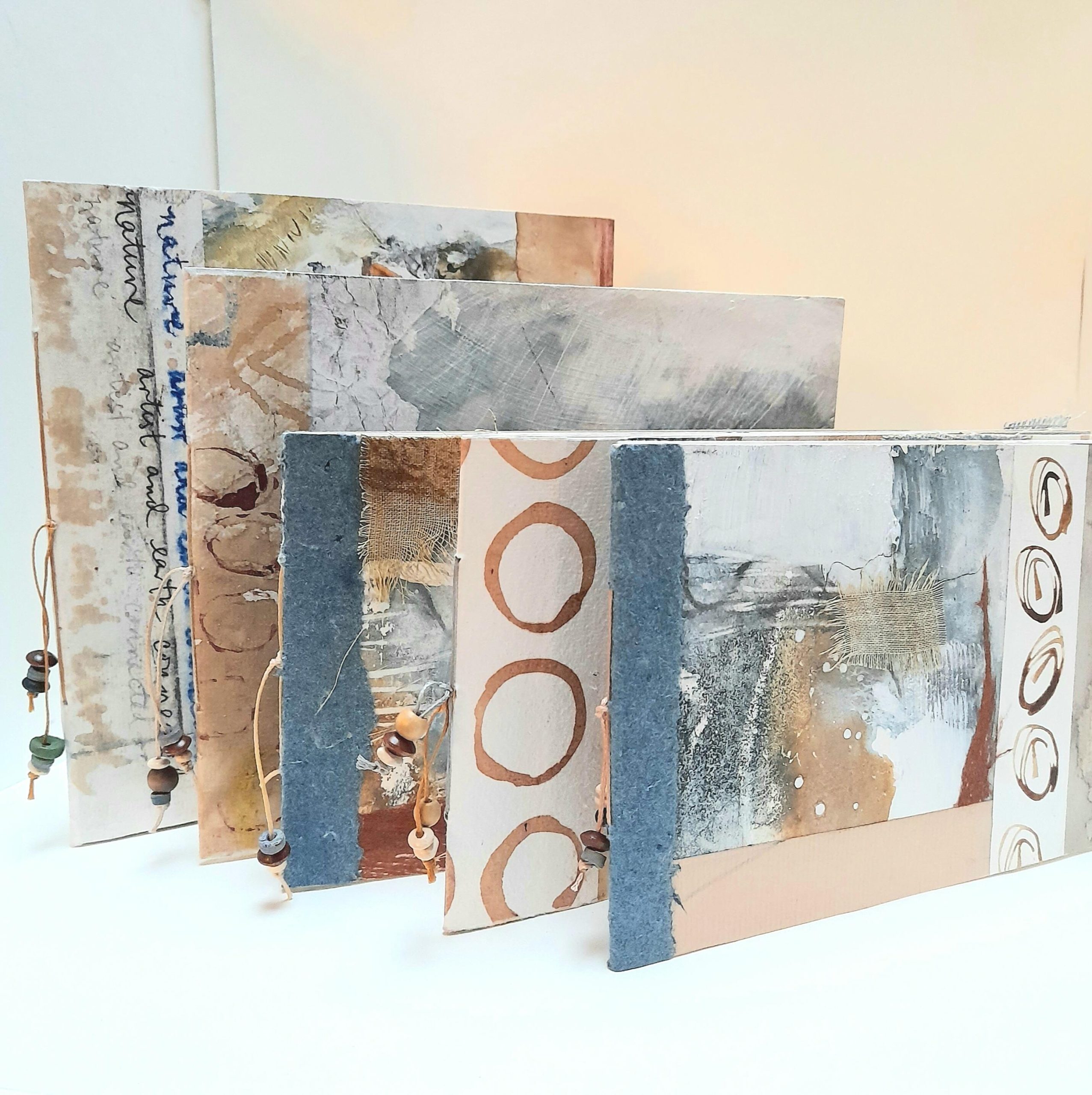 Carol Harvey: 'Books to Buy', handmade sketchbooks with original art covers, blank pages inside for writing or drawing, prices vary £15 - £20