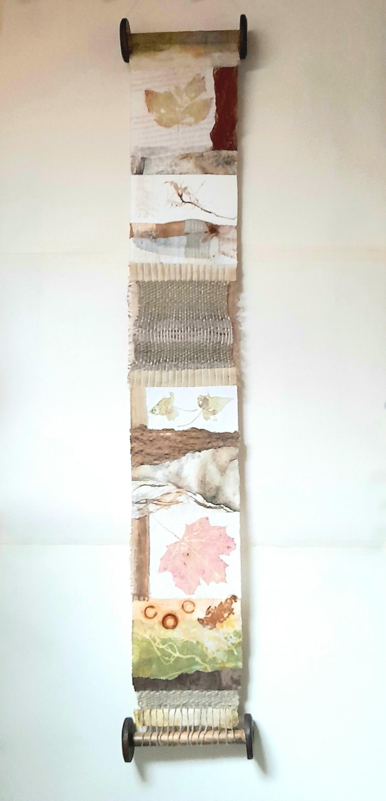 Carol Harvey: 'In Dialogue with Nature', mixed media scroll - natural inks, paints, nature finds, flax and nettle thread, antique woollen spools, 100cm x 15cm x 5cm, £150