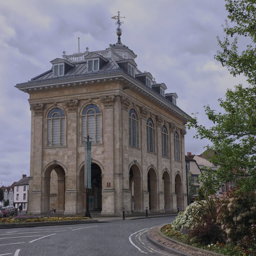 The exterior of Abingdon Museum, showing its historic façade in Abingdon town centre on a bright day.