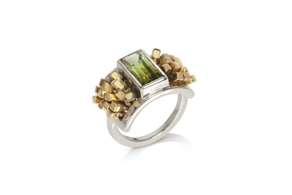 Bi coloured tourmaline ring with kinetic gold elements
