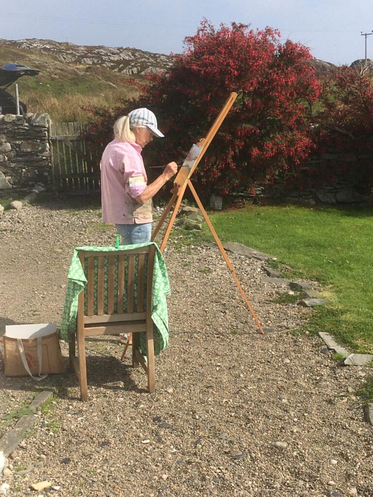 Trisha painting the view on the Scottish island of Colonsay