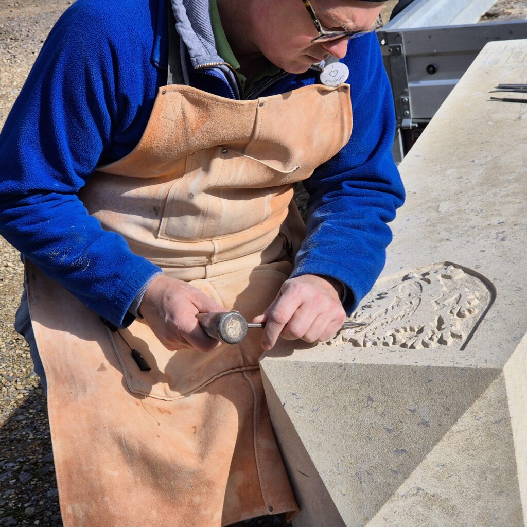 Sculptor David Williams at work on The Bampton Obelisk