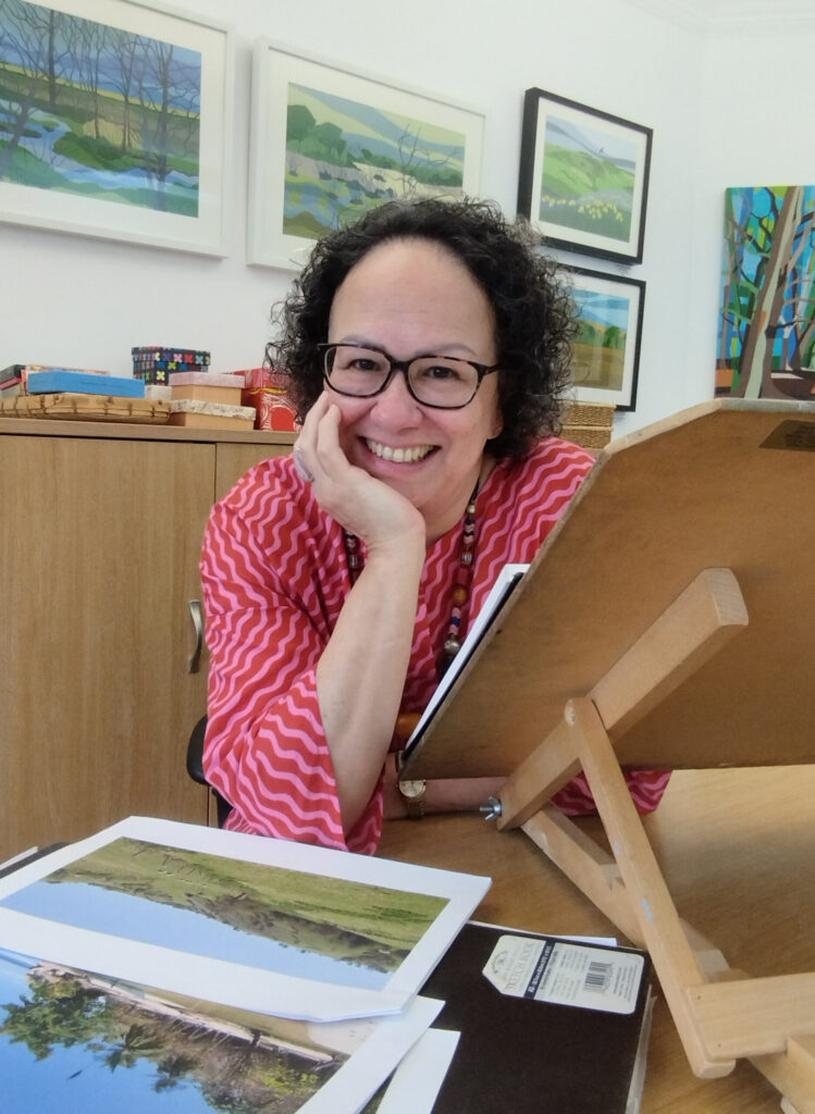 Christine Bass, landscape painter, in her studio