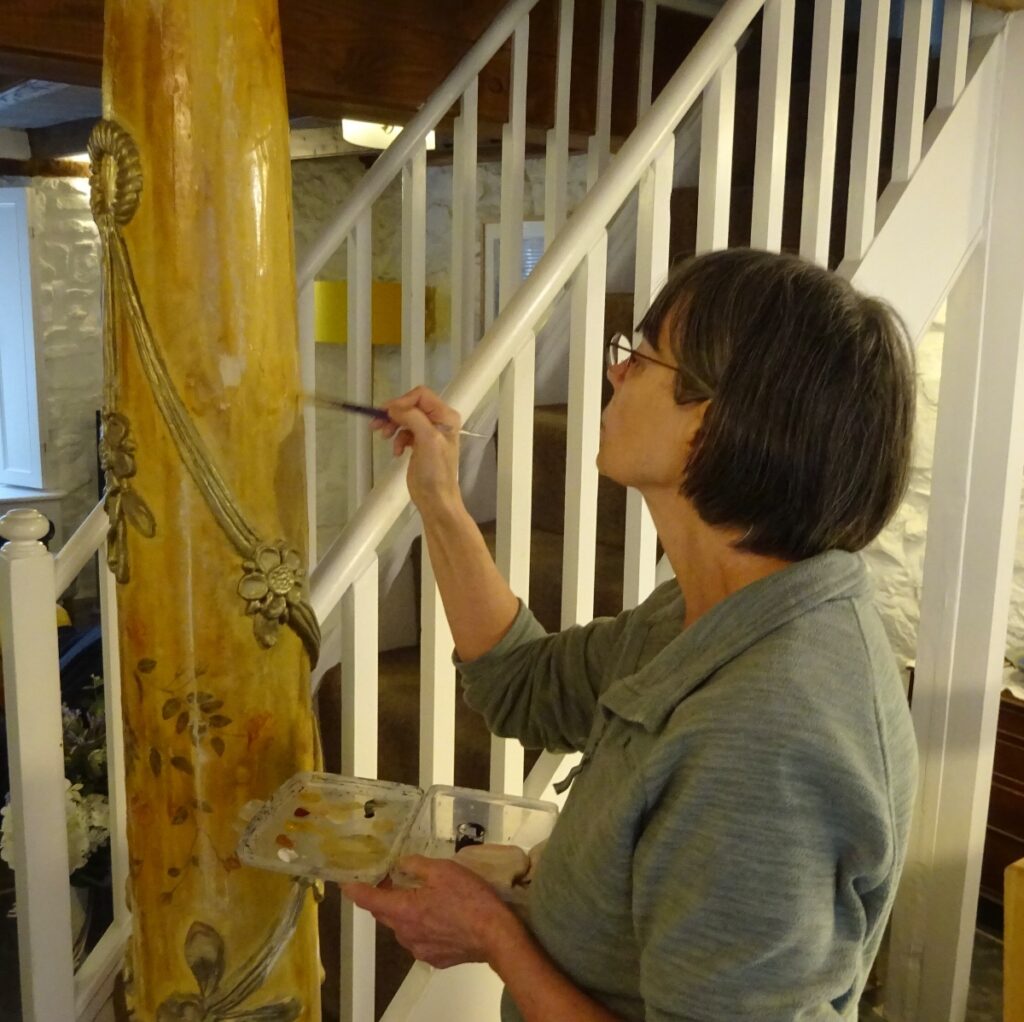 In a friend’s house in Penzance, restoring a decorated pillar made by an artist in the 1970s.