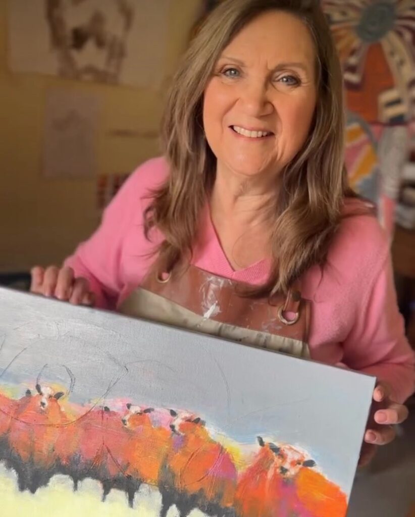 Working on paintings in my studio