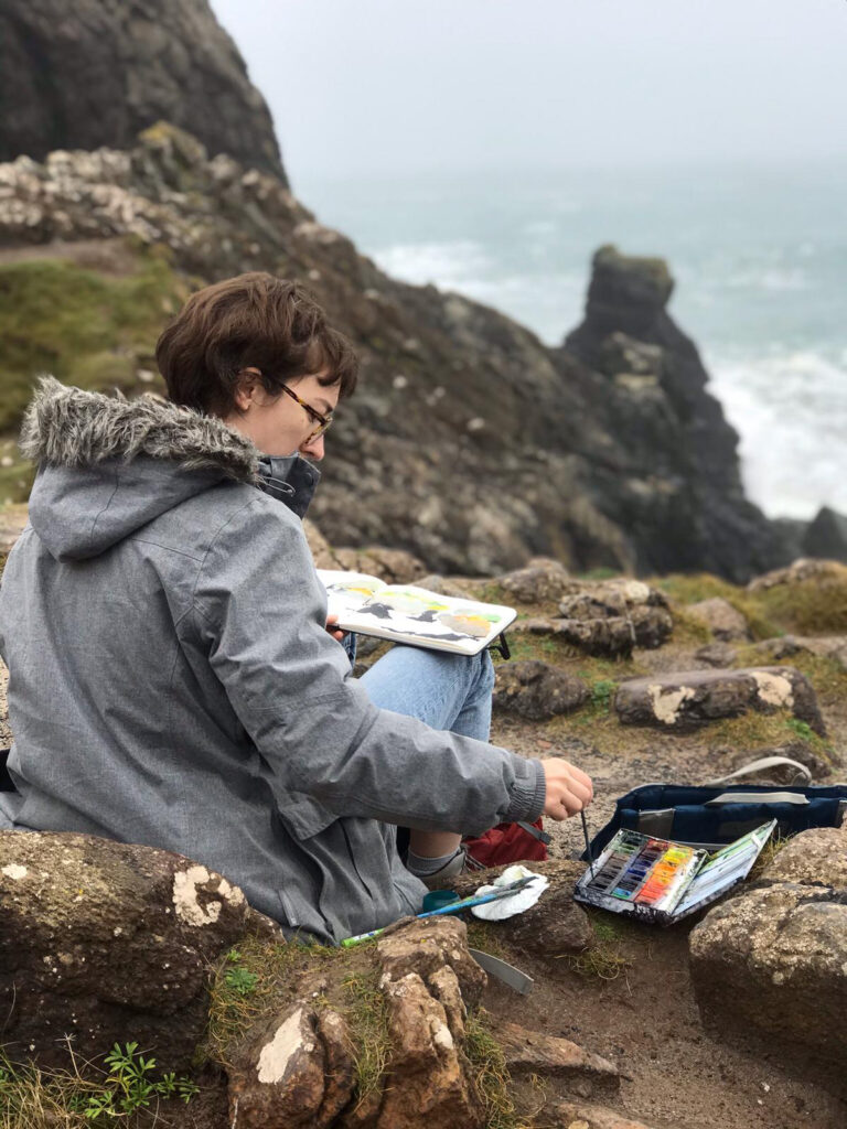 Josie Clouting painting on location in Cornwall