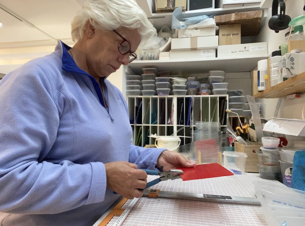 Glass artist at work in studio