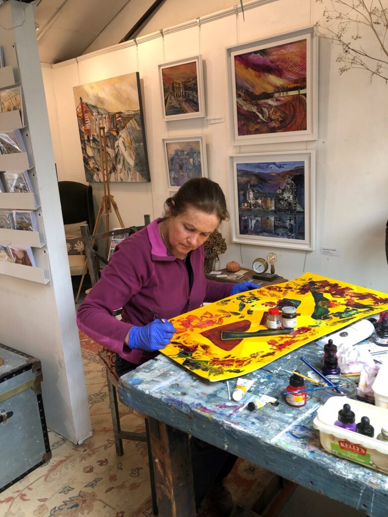 This me working on a collage painting.