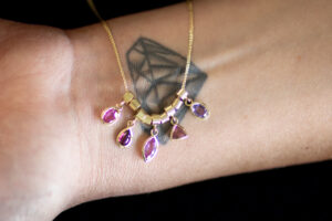 Emily Fermor: Sapphire, Ruby and Garnet stacking pendants all set in 18ct yellow gold