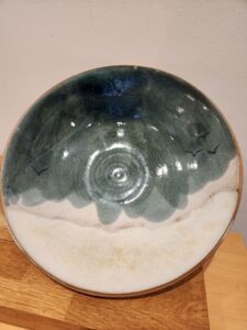 Julie Furniss: Thrown bowl with seaside glaze.