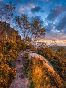 Stuart Feurtado: Landscape along Millstone Edge with a millstone in the foreground