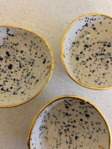 Bridget Hemmings: Splatter Nibbles Bowls , porcelain with gold lustre finish