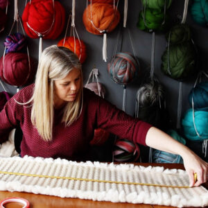 Cassandra Smith: Weaving process of Cassandra Sabo constructing a lampshade