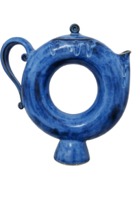 Haleh Walton: Decorative ceramic teapot sculpture in deep oceanic blue captures movement and flow in clay