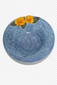 Haleh Walton: Elegantly crafted and finished in a speckled blue glaze, this ceramic bowl is crowned with two sculpted golden roses
