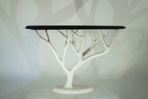 Theo Silkstone: A sculptural coral inspired table made from hand-carved sycamore