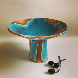 Sally Dorrity WOA: dish on tall foot, stoneware clay, dry blue glaze