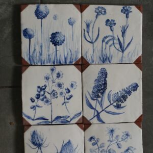 Philippa Norris WOA: A few handpainted earthenware tiles. These and more form the splash back in my pottery. Similar can be made on a commission basis. They also function well as coasters.
