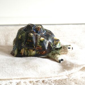 Philippa Norris WOA: Hidden inside this tortoise is a small container. Slip cast porcelain.