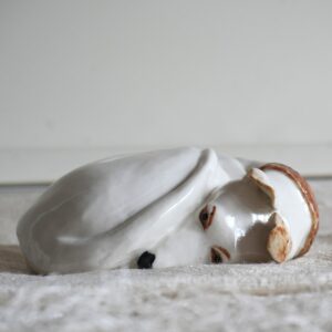 Philippa Norris WOA: Ever watchful whippet cast in porcelain.