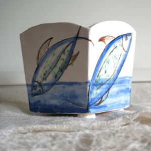 Philippa Norris WOA: Hand built container for a beautiful plant in an ugly plastic pot.