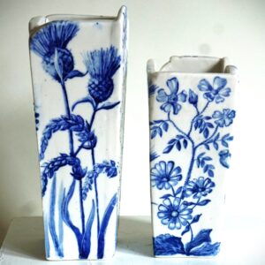 Philippa Norris WOA: A wild flower meadow captured on porcelain, hand painted with cobalt blue.