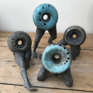 Helen Woolner: Collection of legged doughnut sculptures