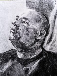 Jane Kelly OAS, SOA: Head of a Man. Portrait in charcoal on paper.