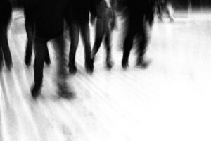 Fliss van Steenbergen: A photograph that looks like a charcoal sketch of an ice skating race