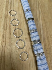 Joy Cecilia Taylor: Silver rings: textured, pressed, or with set stones.