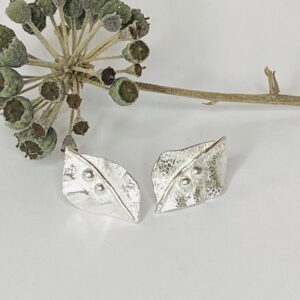 Tsedey Roscoe: Earrings - Textured leaf form earrings with two silver balls